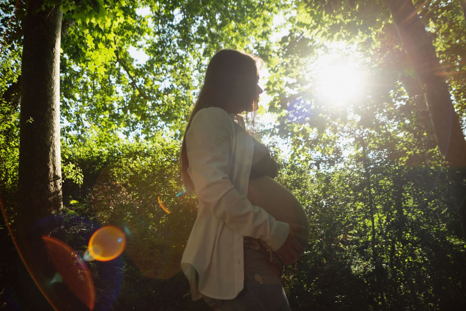 Pregnant woman in the woods