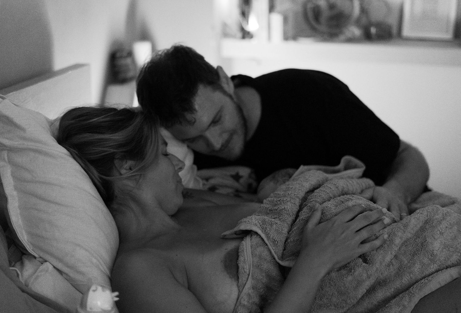 Couple welcoming the baby after birth