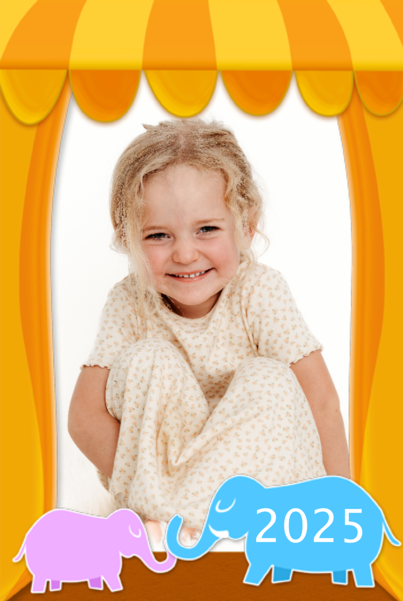 A festive yellow and orange striped awning frames a child with blonde curly hair in a cream polka dot dress with elephant designs below.