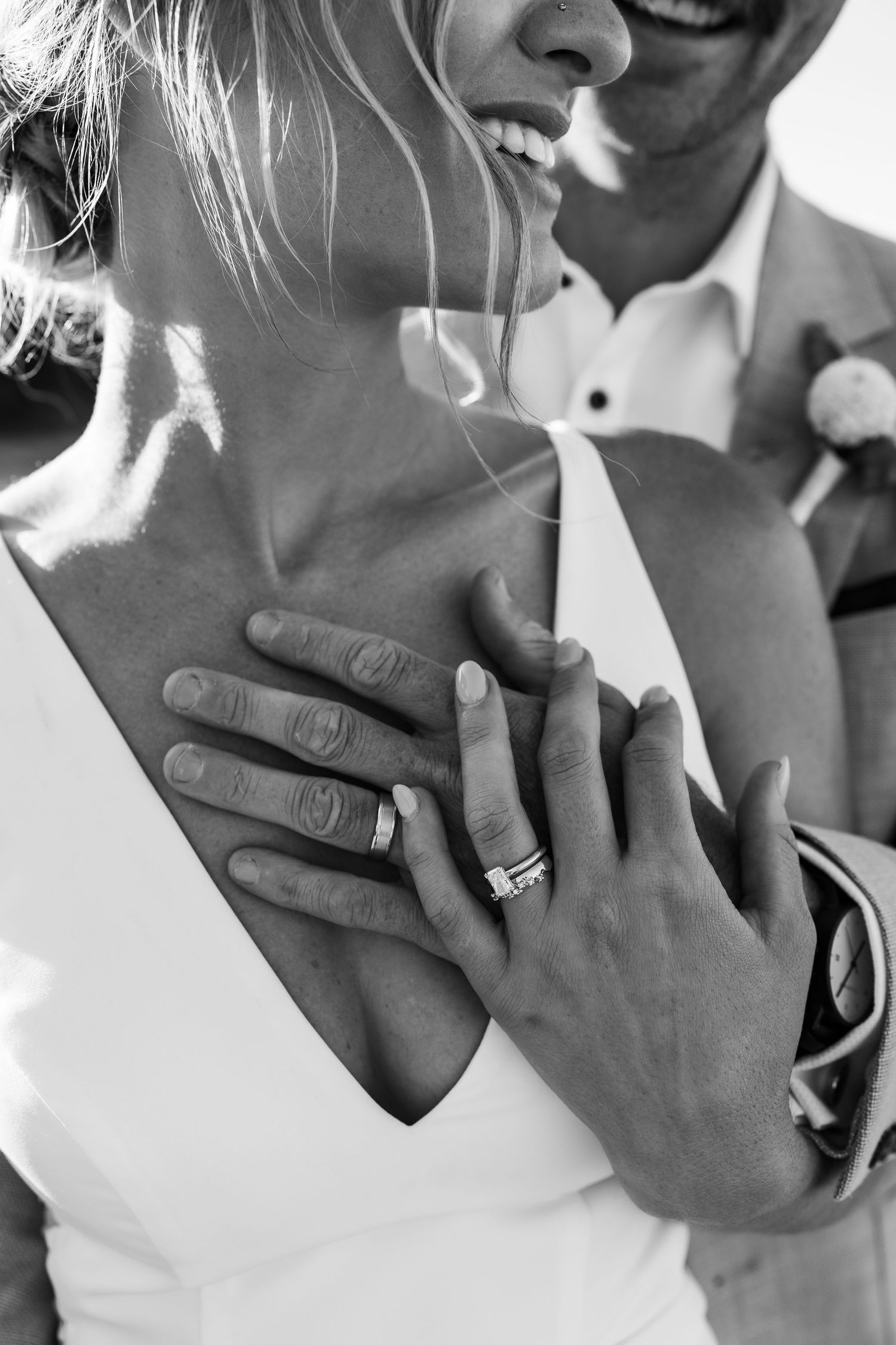 A series of black and white close-up photos showing hands with wedding rings and intimate romantic moments.