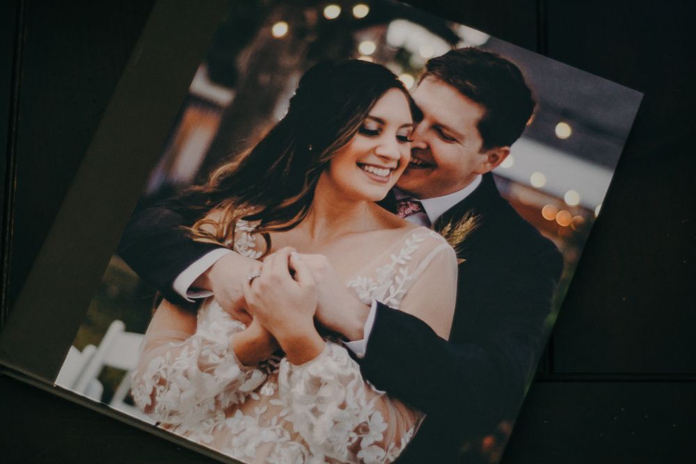 A romantic photograph featuring a couple in an intimate embrace.
