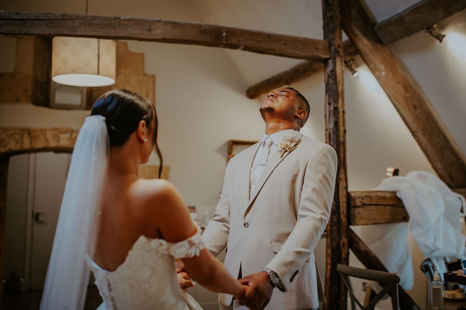 Bride and groom exchanging private vows before their wedding ceremony - Lapstone Barn – Chipping Campden, The Cotswolds