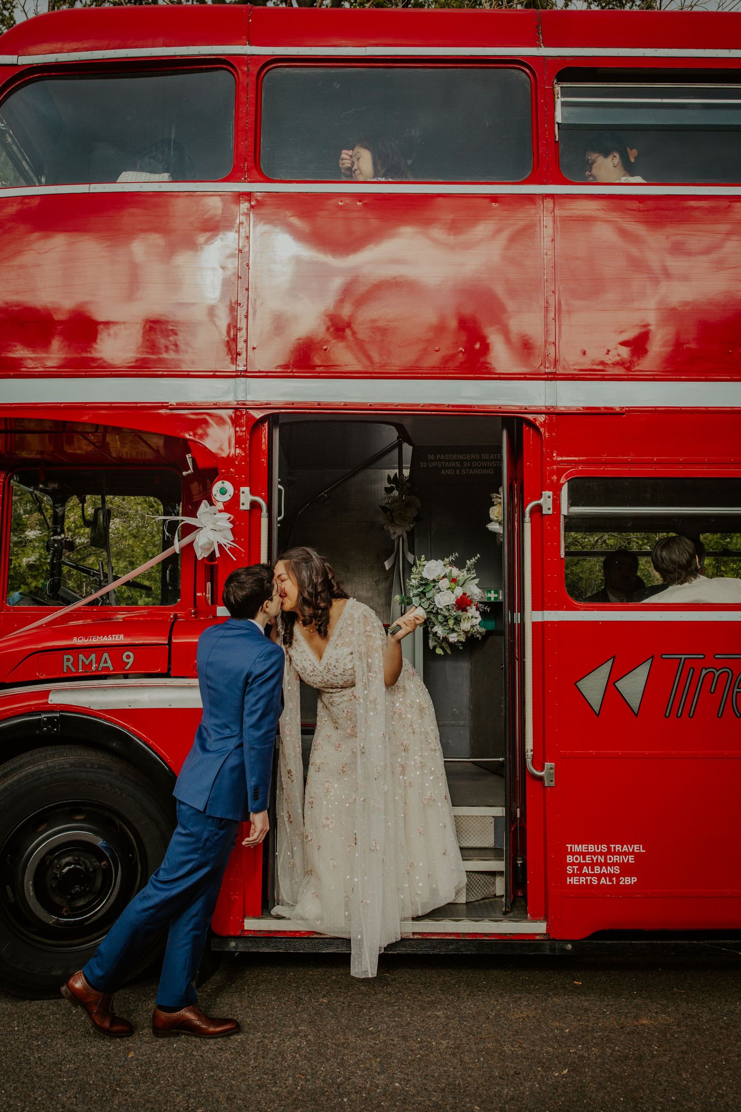 Bride and Groom on London wedding bus.