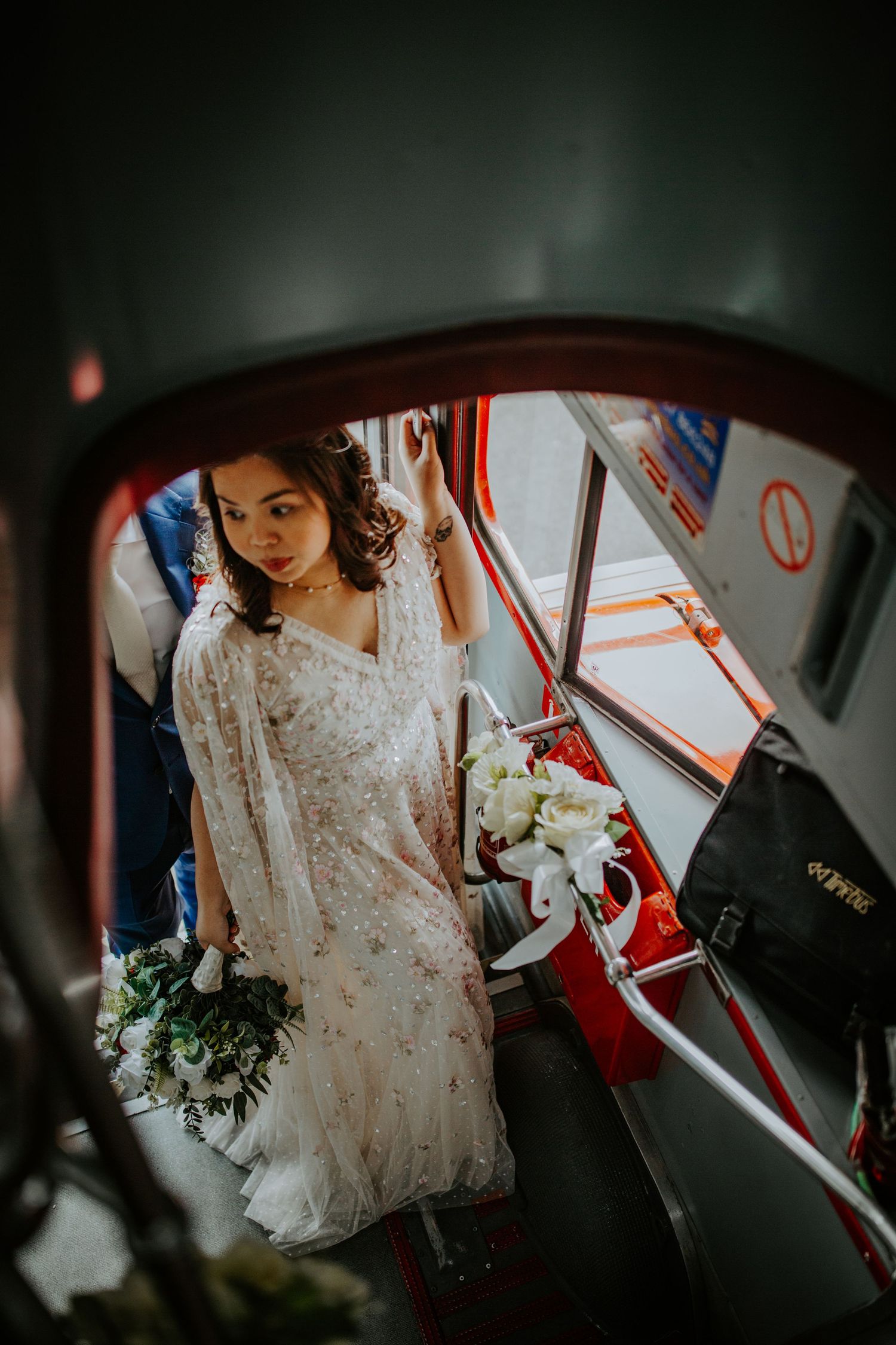 Bride and Groom on London wedding bus.