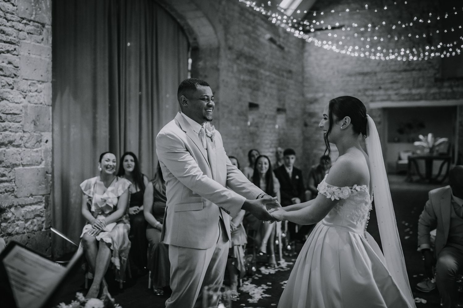 Bride and groom at their wedding ceremony - Lapstone Barn – Chipping Campden, The Cotswolds