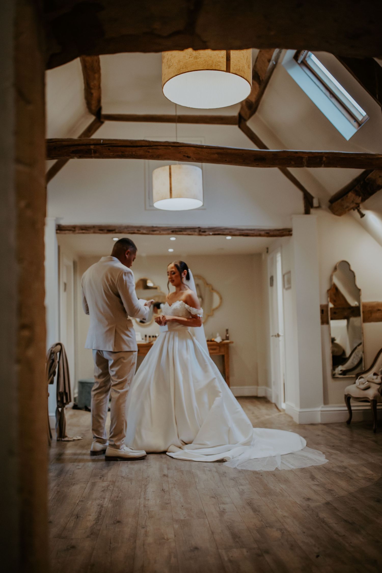 Bride and groom exchanging private vows before their wedding ceremony - Lapstone Barn – Chipping Campden, The Cotswolds