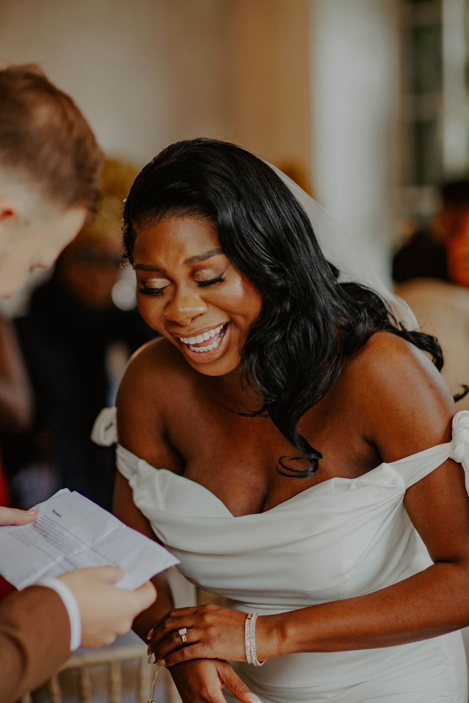 Bride laughing at her wedding ceremony at Morden Park House - London - RELM Photography