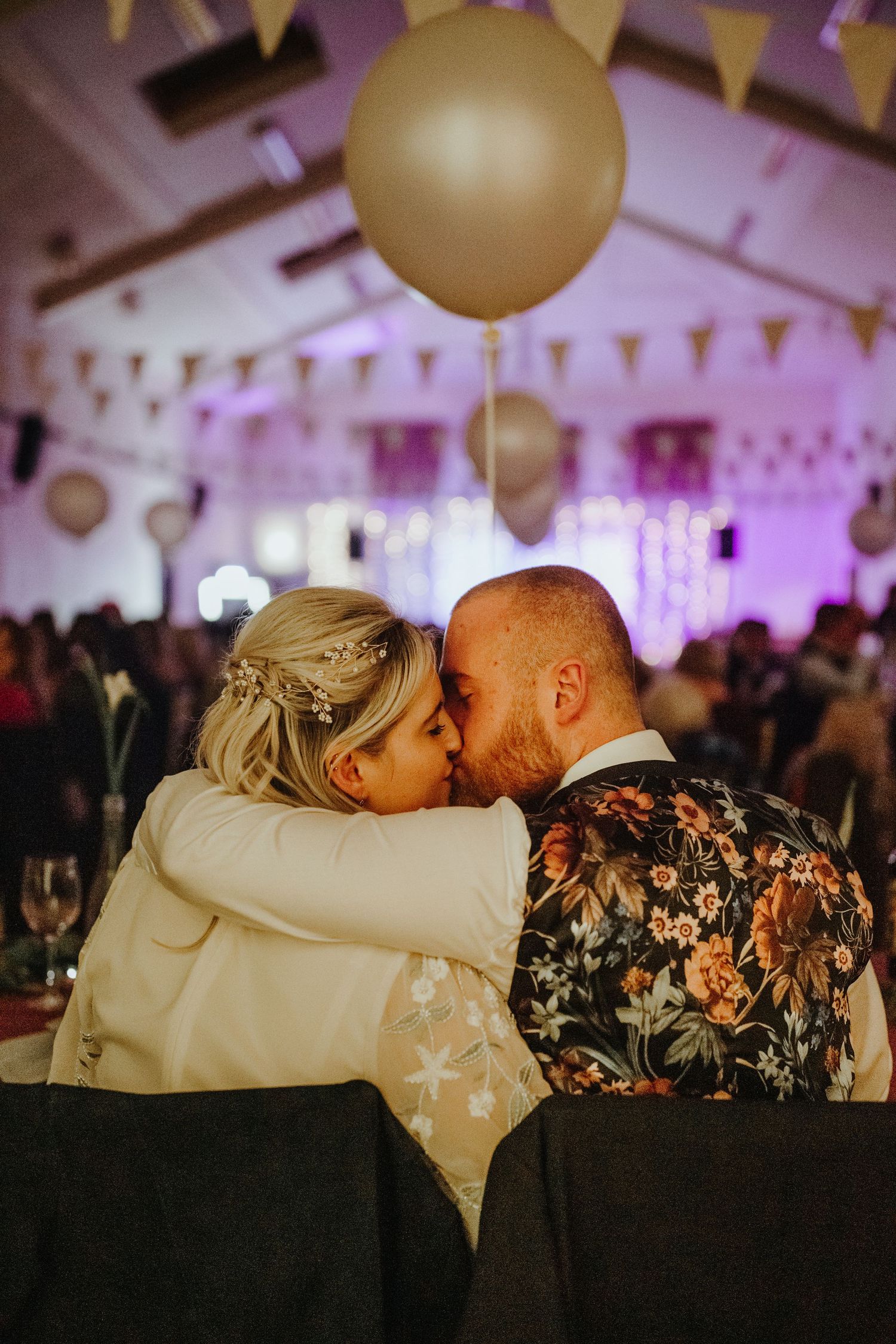 Bride and Groom kissing at Cottered Village Hall Hertfordshire, Photographer RELM Photography