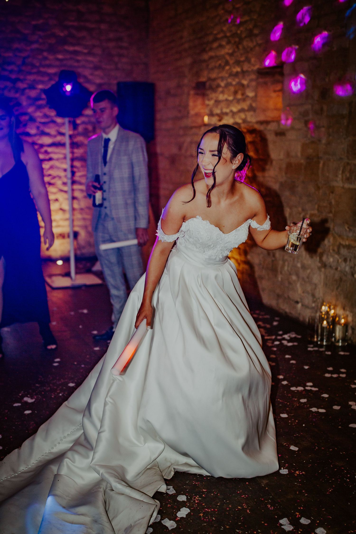 Bride dancing on the dance floor at their wedding venue Lapstone Barn – Chipping Campden, The Cotswolds