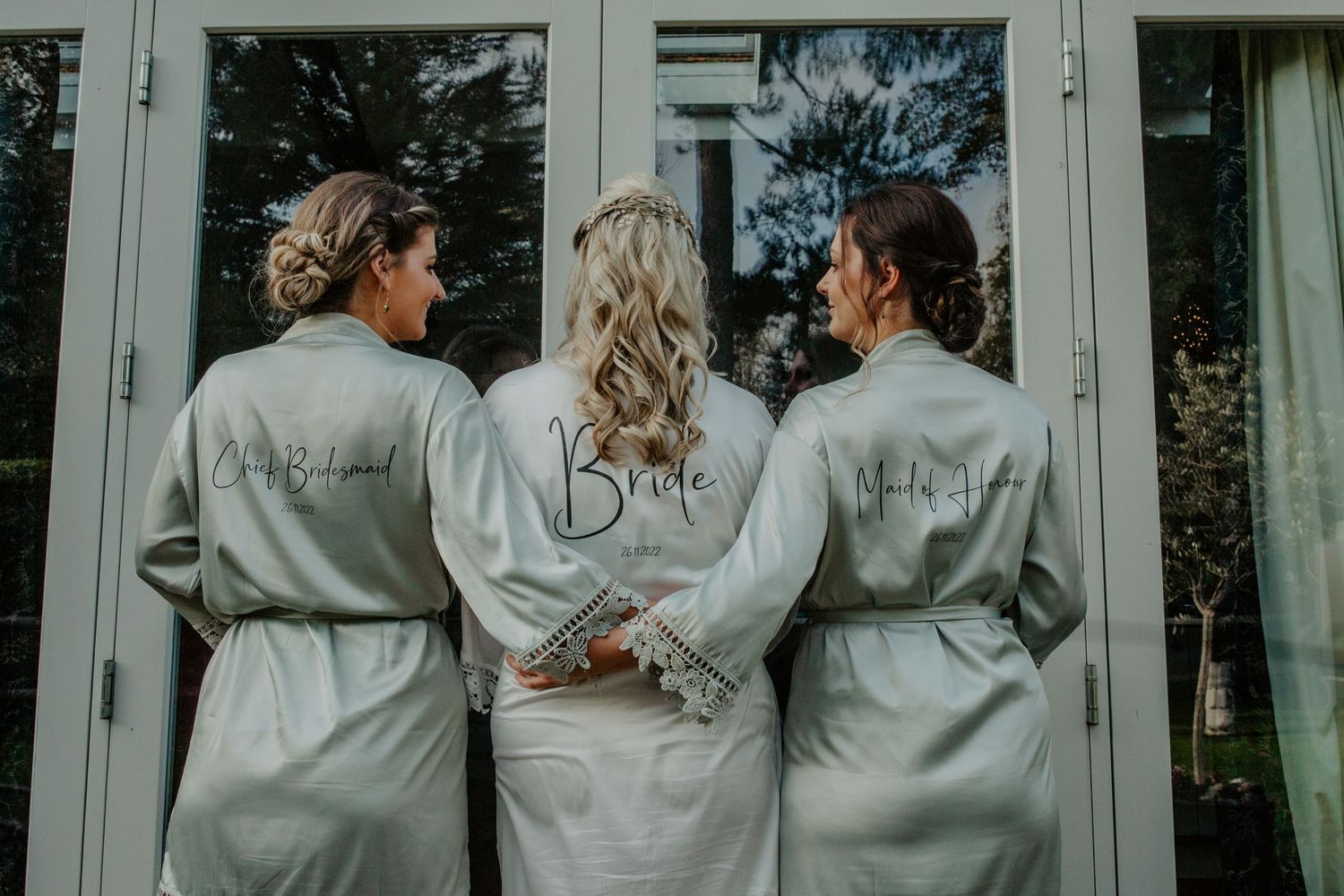 Bride with sisters in bridal robes in Hertfordshire – RELM Photography