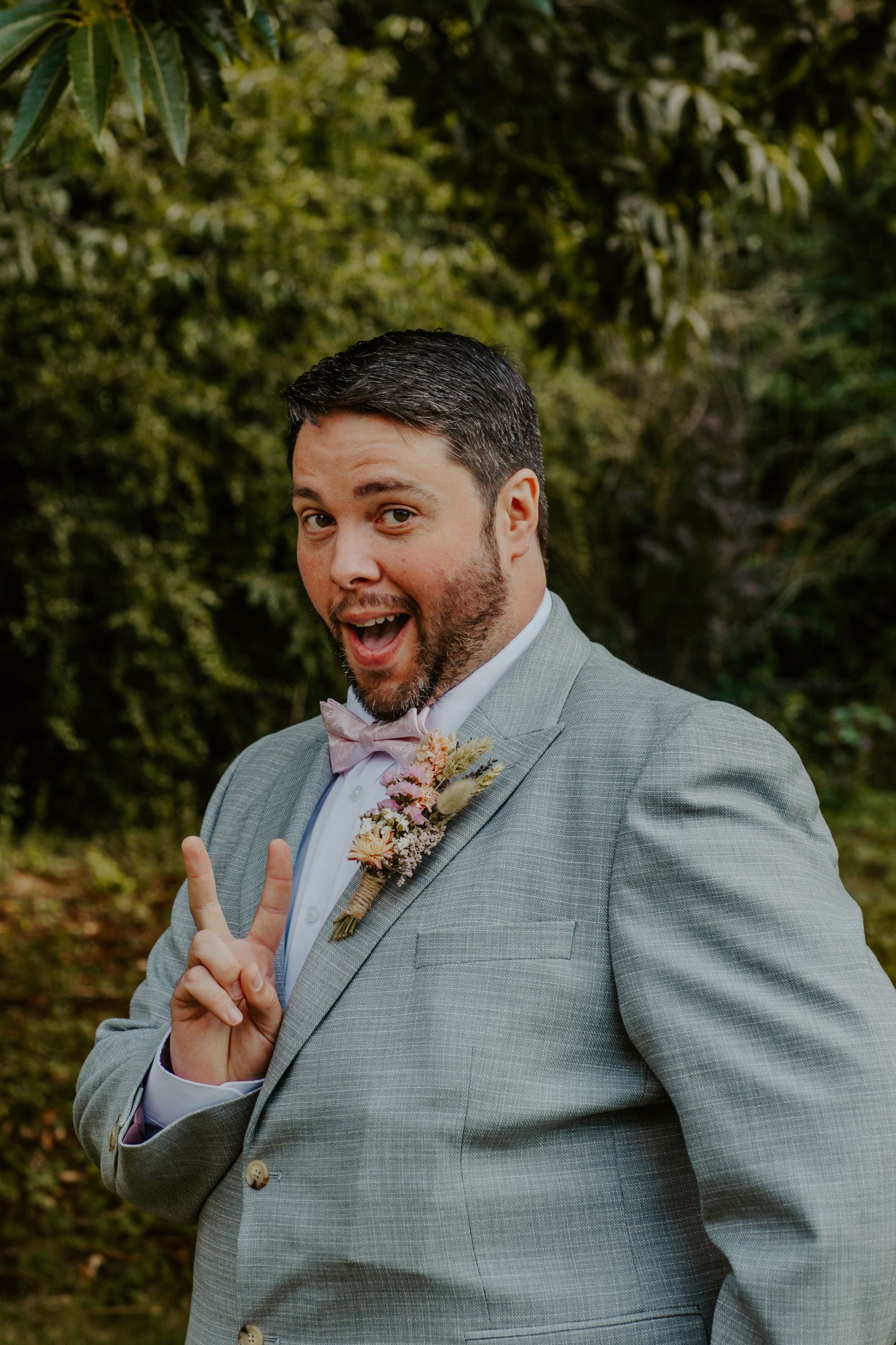 Best man posing at wedding