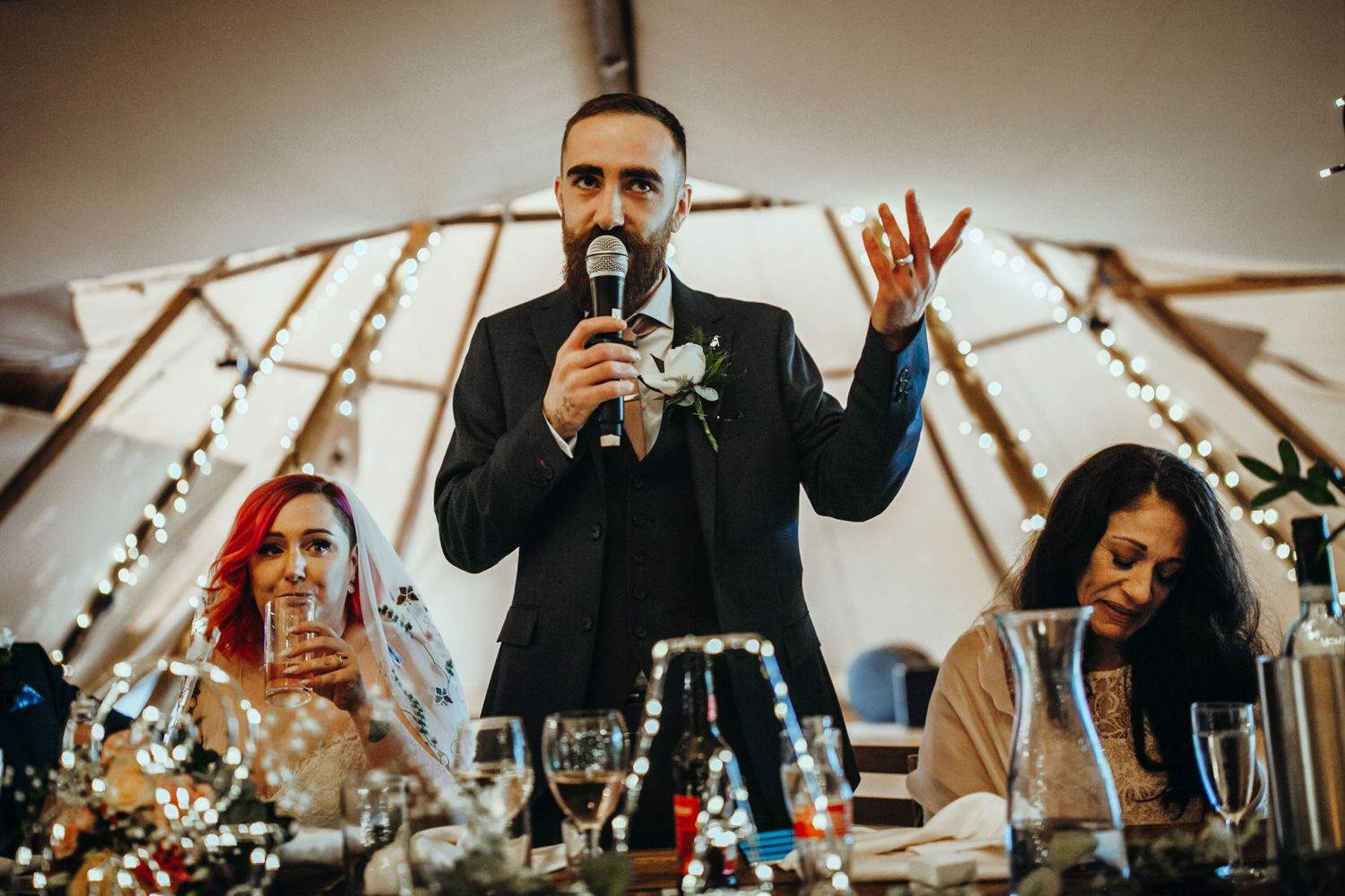 A groom’s words – The groom raises his glass in a toast, thanking family and friends for their love and support.