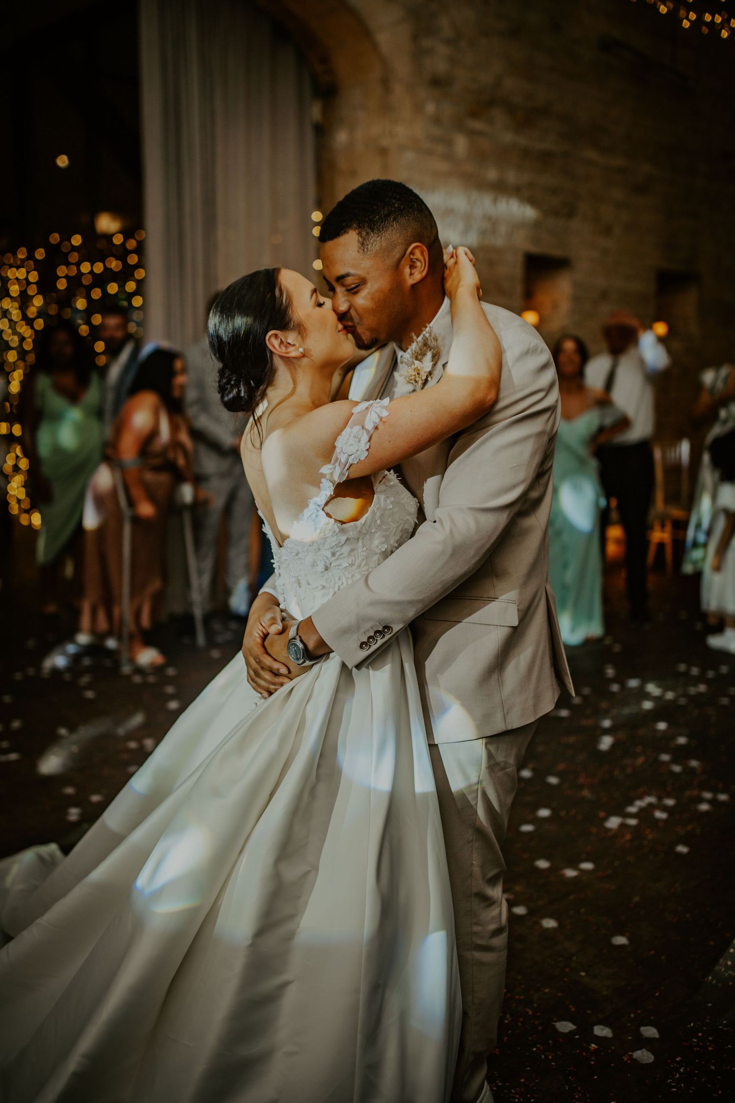 Bride and groom having their first dance on the dance floor at their wedding venue Lapstone Barn – Chipping Campden, The Cotswolds