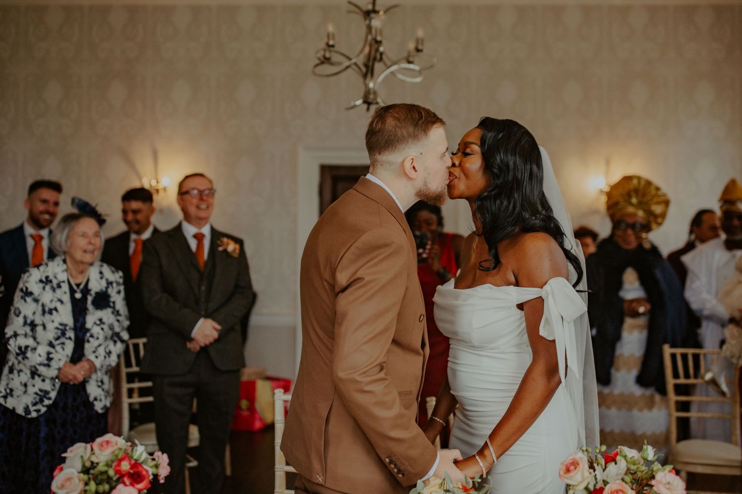 Bride and Groom share first kiss at their wedding ceremony at Morden Park House - London - RELM Photography