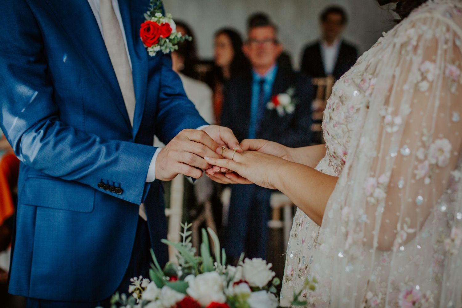Wedding couple exchange rings in a heartfelt ceremony at Morden Park, London.