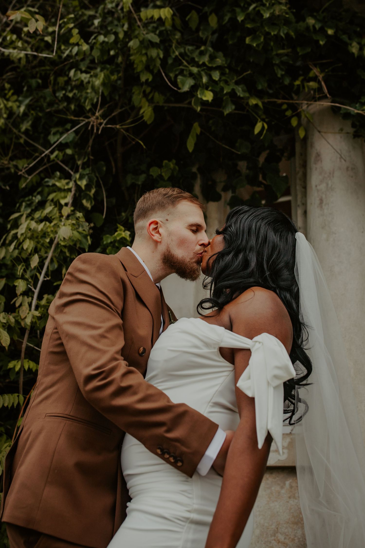 Bride and Groom kissing outside Morden Park House - London - RELM Photography