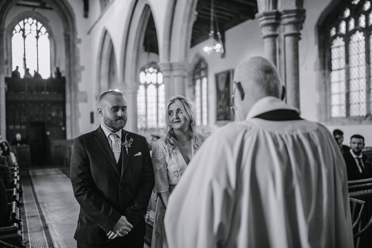 Bride and groom during wedding ceremony at Braughing Church Hertfordshire, Photographer RELM Photography