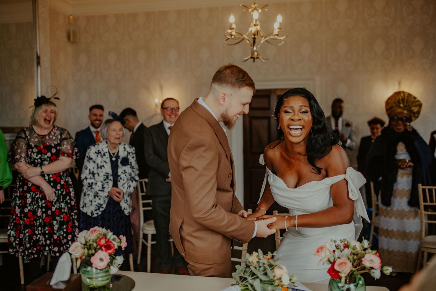 Bride and Groom laughing at their wedding ceremony at Morden Park House - London - RELM Photography