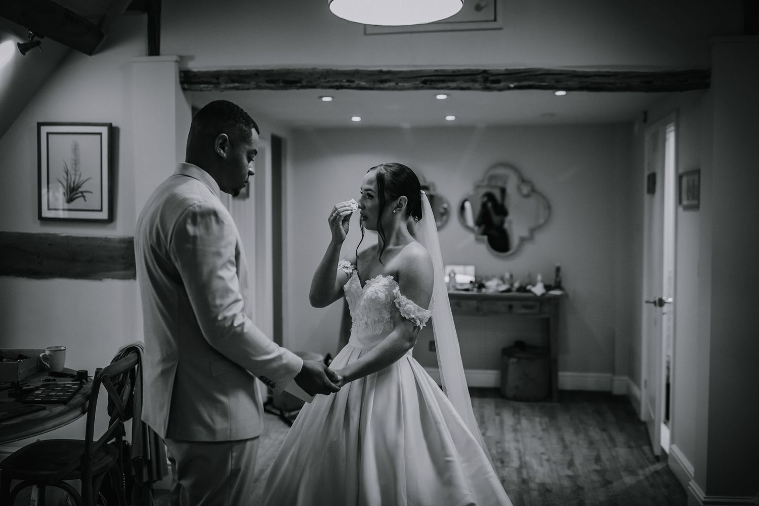 Bride and groom exchanging private vows before their wedding ceremony - Lapstone Barn – Chipping Campden, The Cotswolds