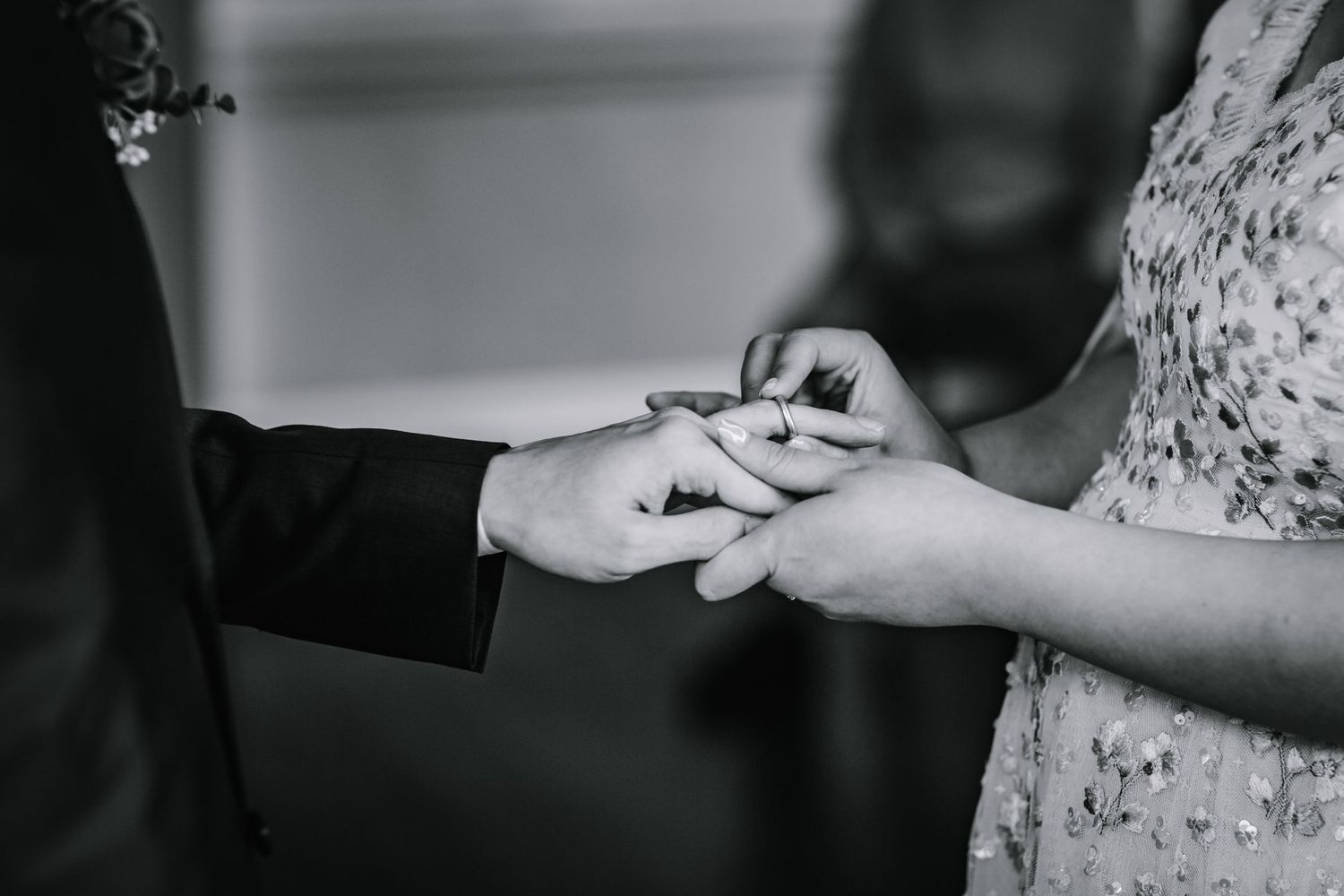 Wedding couple exchange rings in a heartfelt ceremony at Morden Park, London.