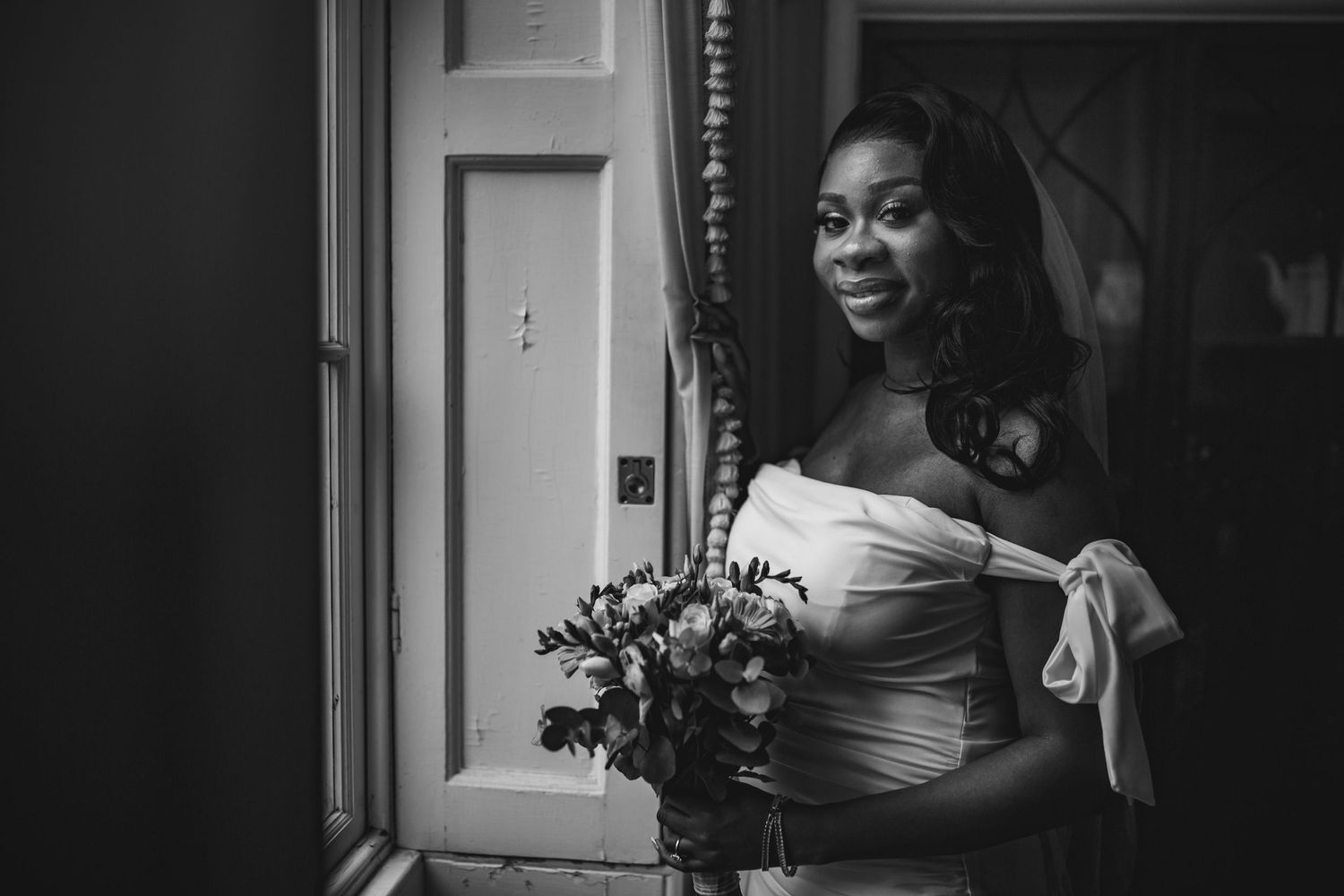 Bride posing by the window at Morden Park House - London - RELM Photography