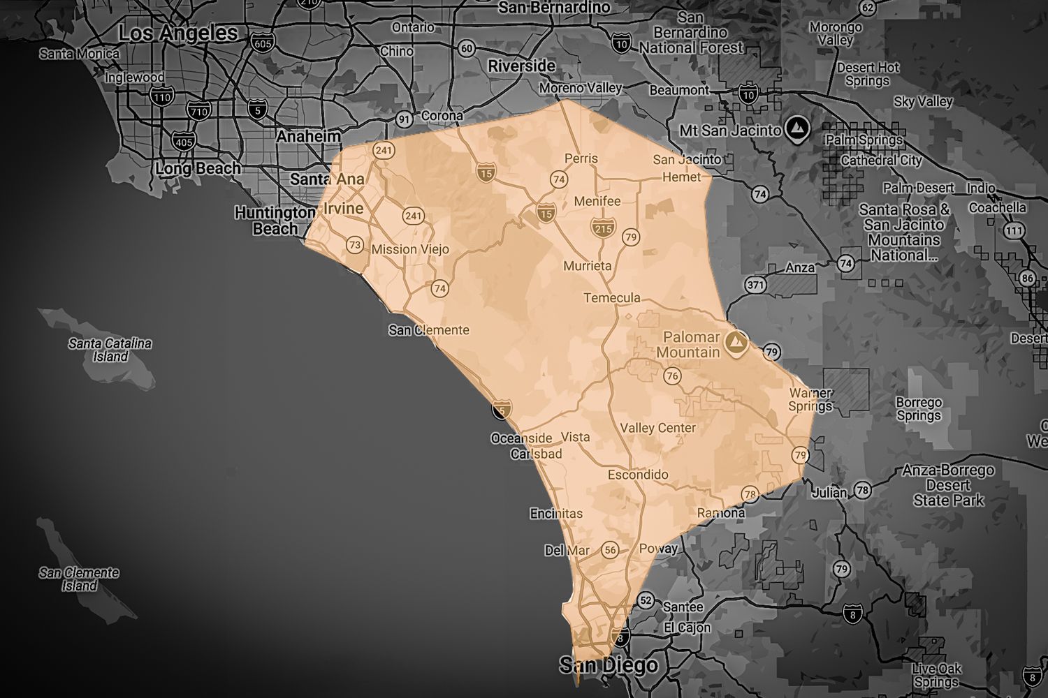 Map highlighting a shaded region in San Diego County, California, showing cities and roads on a dark background.
