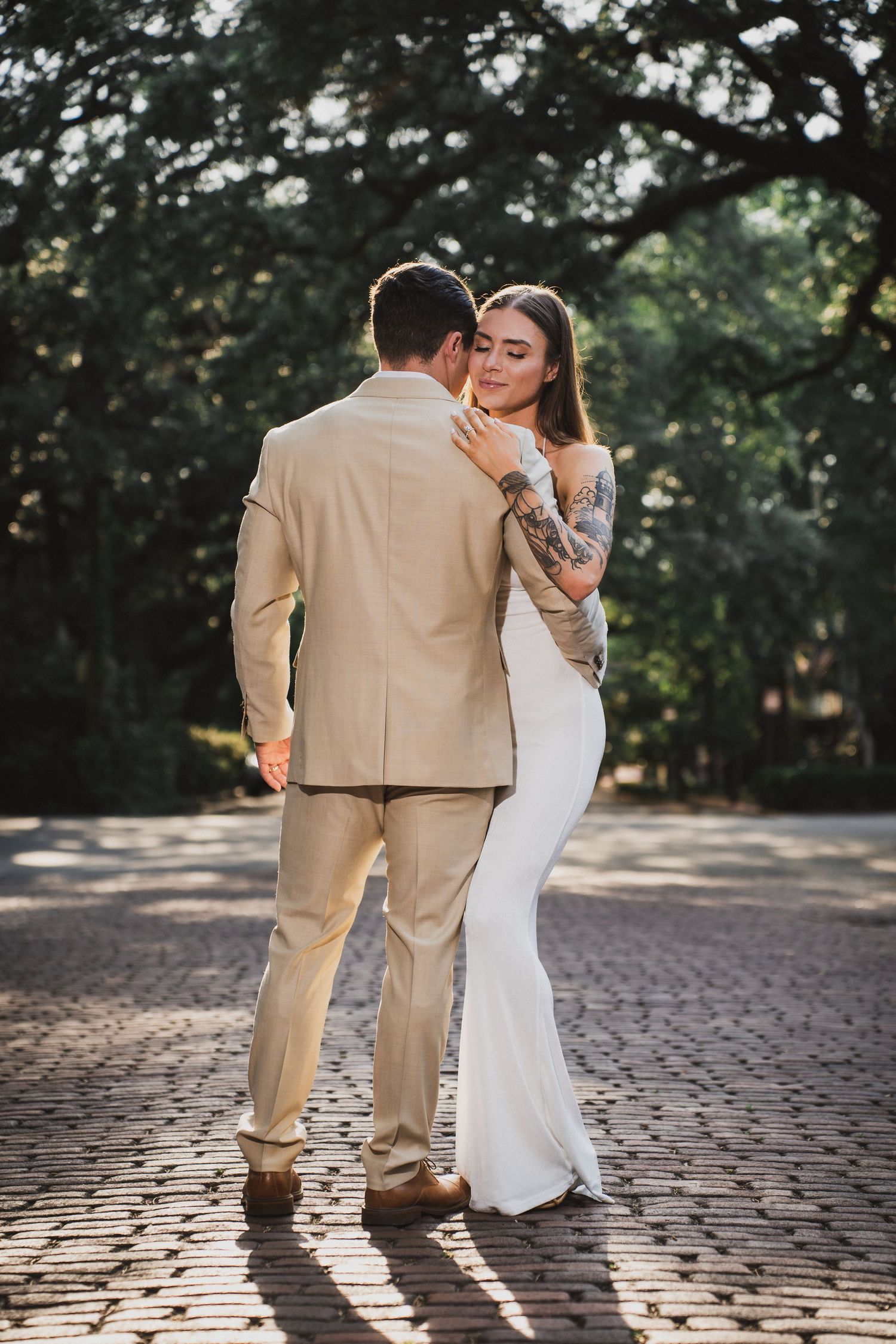 Romantic couples photography session in Savannah featuring elegant bridal fashion and timeless historic scenery by GoodnRich Photography