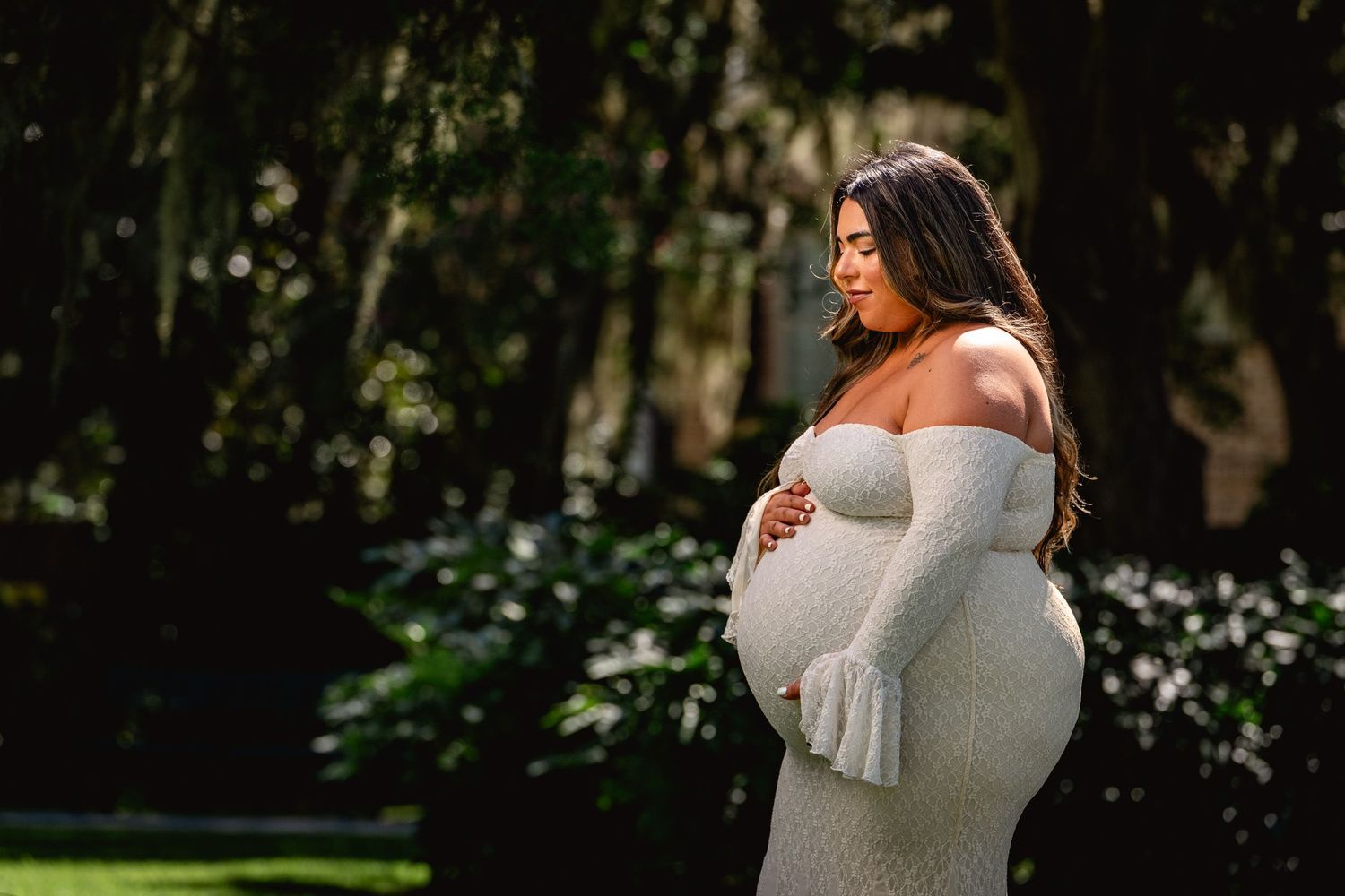 Outdoor maternity photography portrait in Bluffton featuring soft natural lighting and timeless lifestyle imagery by GoodnRich Photography