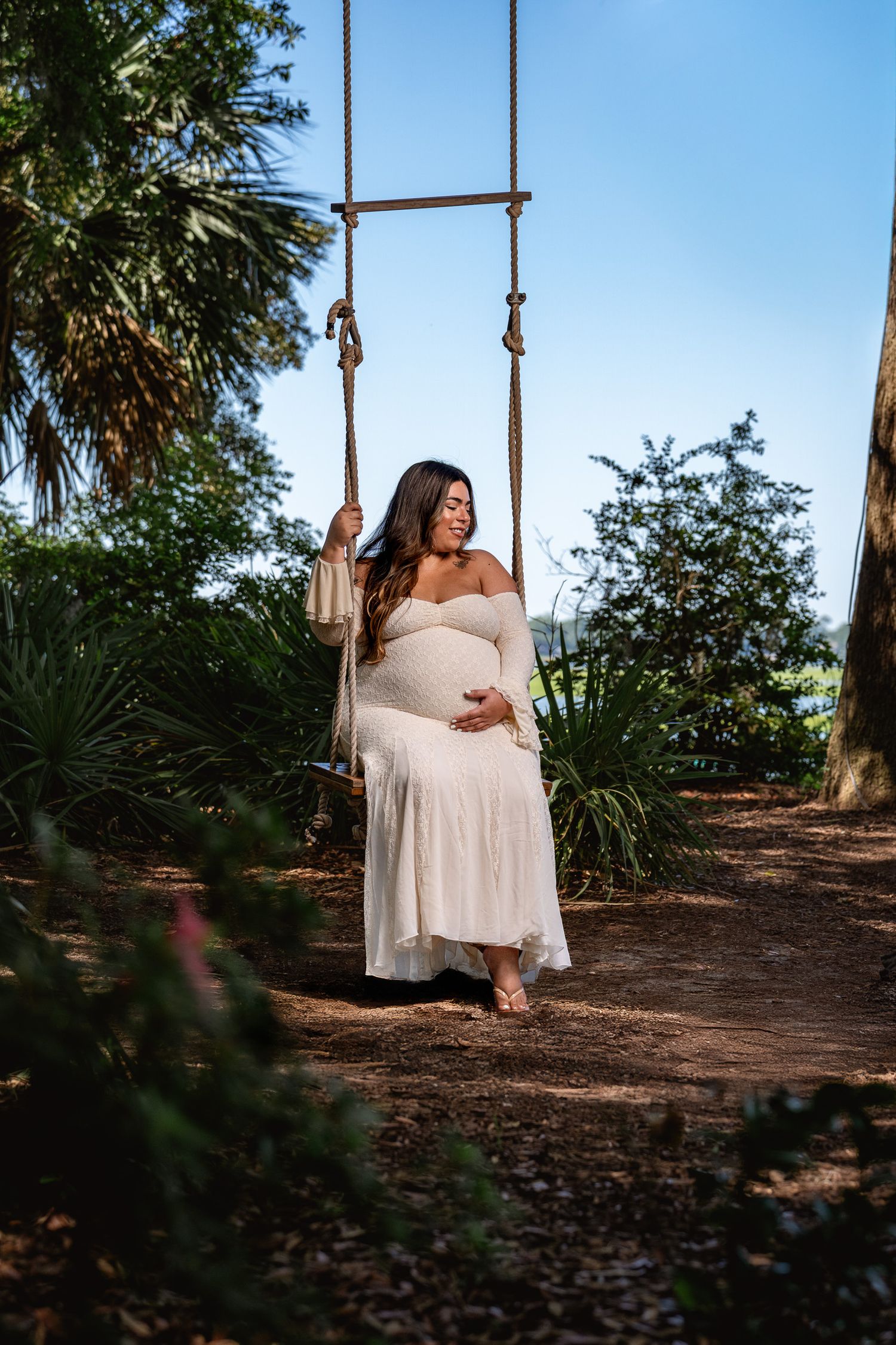 Outdoor maternity photography session in Bluffton featuring soft natural light and peaceful Lowcountry scenery by GoodnRich Photography