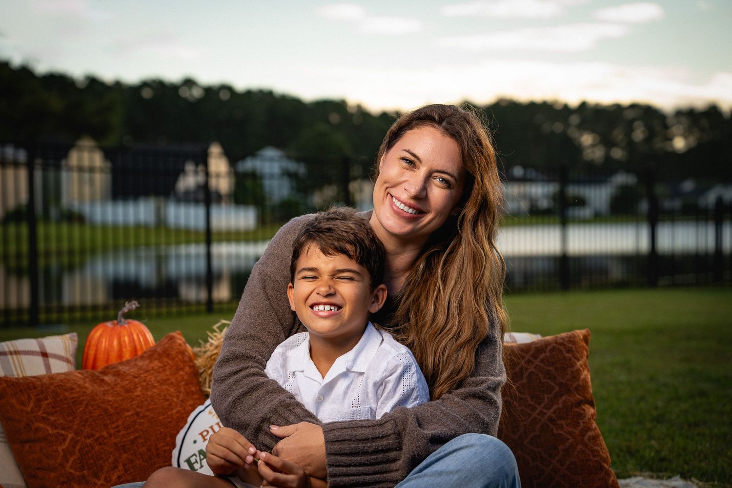 Family lifestyle photography session in Bluffton featuring a mother and son captured during golden hour by GoodnRich Photography