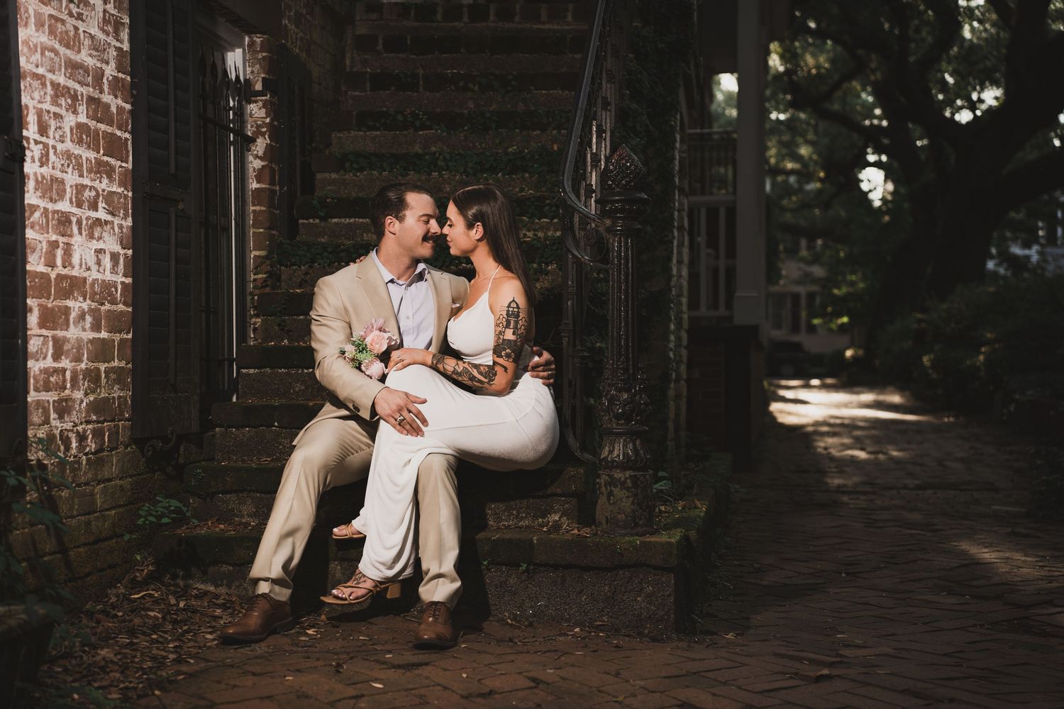 Romantic couples photography session in Savannah featuring cinematic lighting and historic downtown scenery by GoodnRich Photography