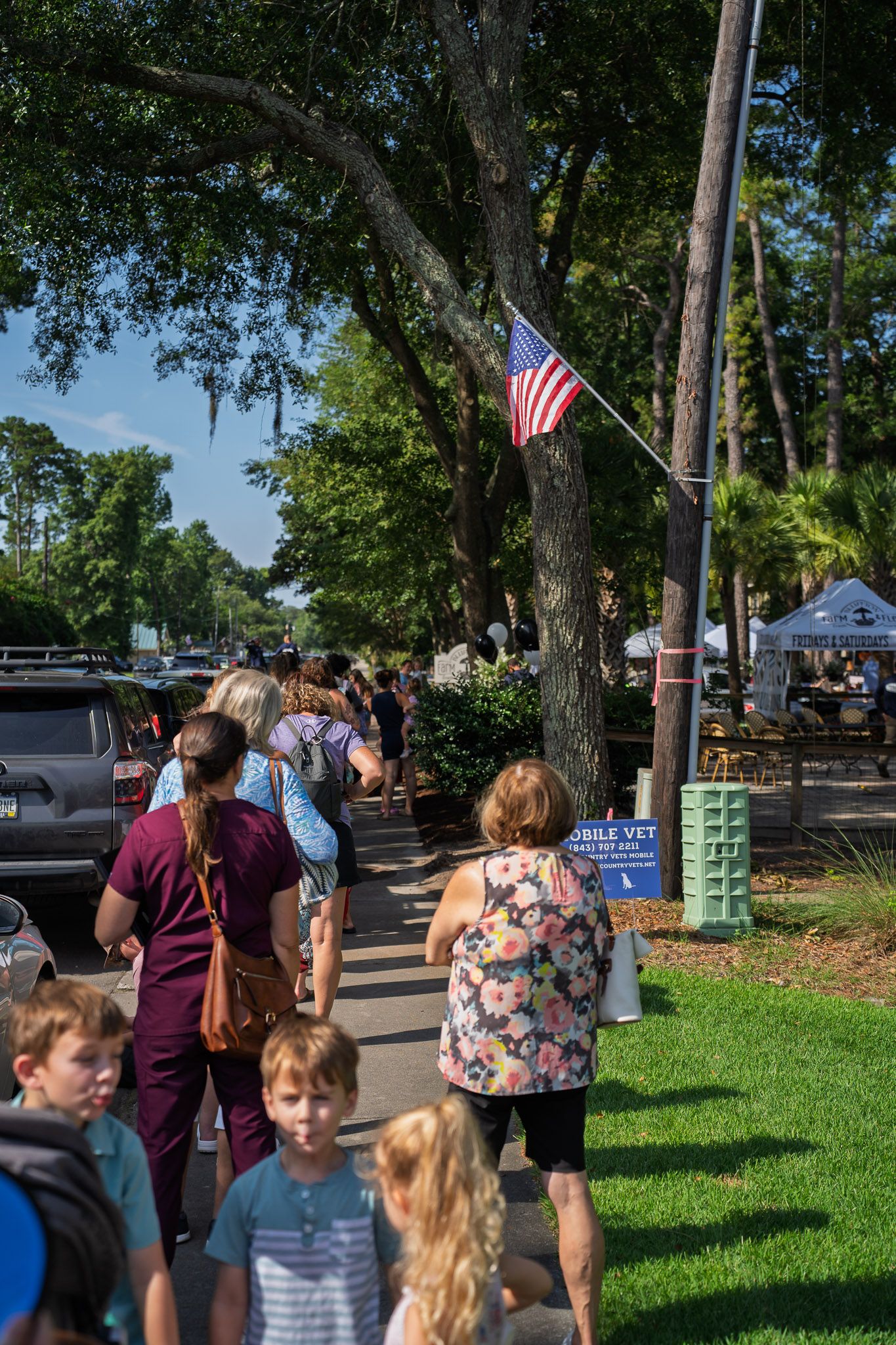 Black and white balloons decorate the entrance to Bluffton Farm and Flea during the grand opening celebration in Bluffton, South Carolina.