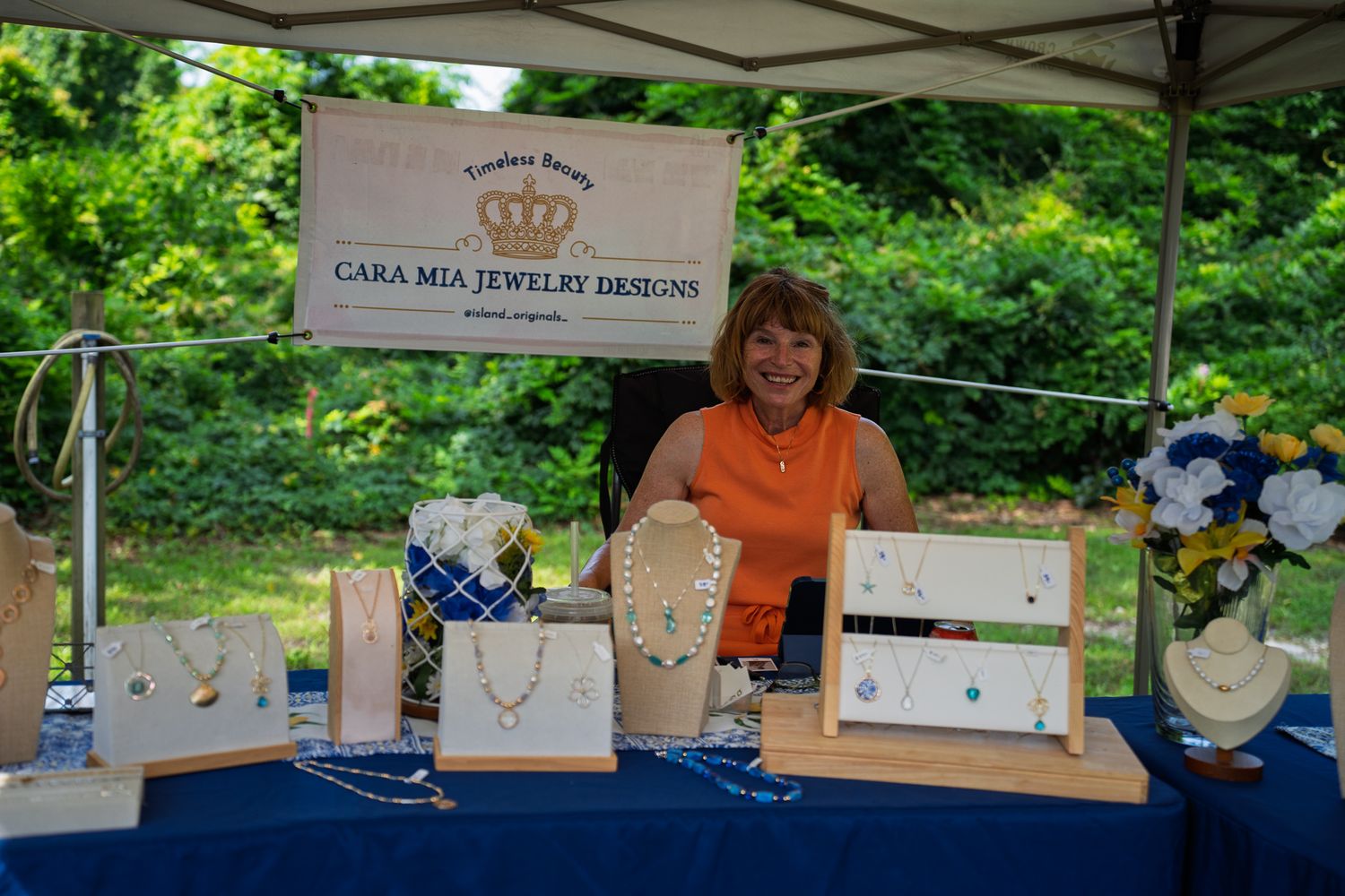 Cara Mia Jewelry Designs showcases handcrafted necklaces and earrings during the Bluffton Farm and Flea grand opening in Bluffton, South Car