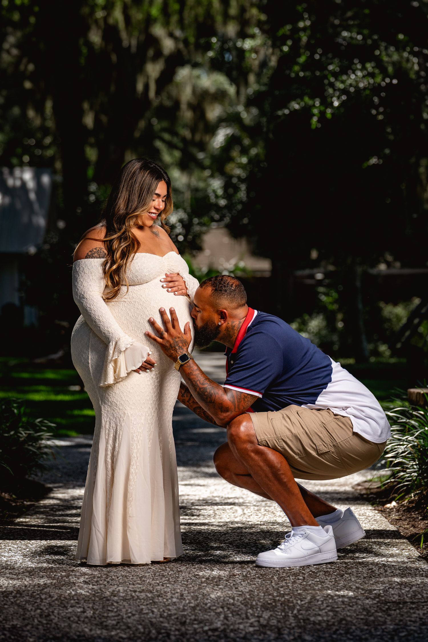 Maternity photography session in Old Town Bluffton captured with natural connection and timeless outdoor lighting by GoodnRich Photography