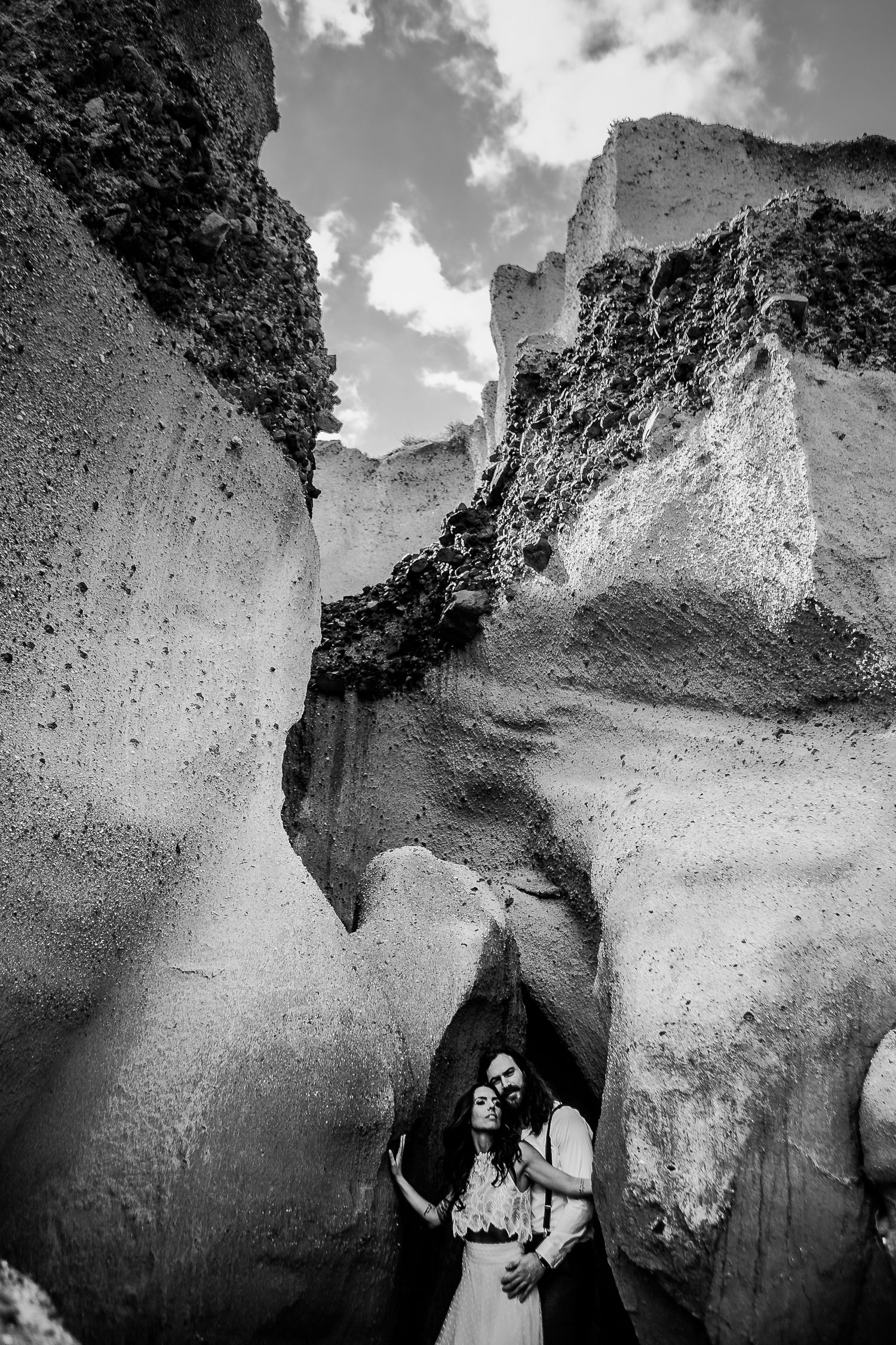 Romantic elopement photoshoot in Santorini, capturing authentic connection and scenery