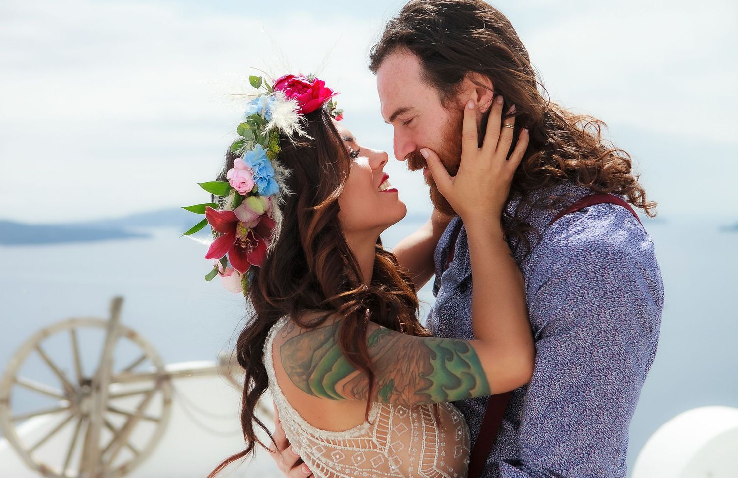 Romantic elopement photoshoot in Santorini, capturing authentic connection and scenery