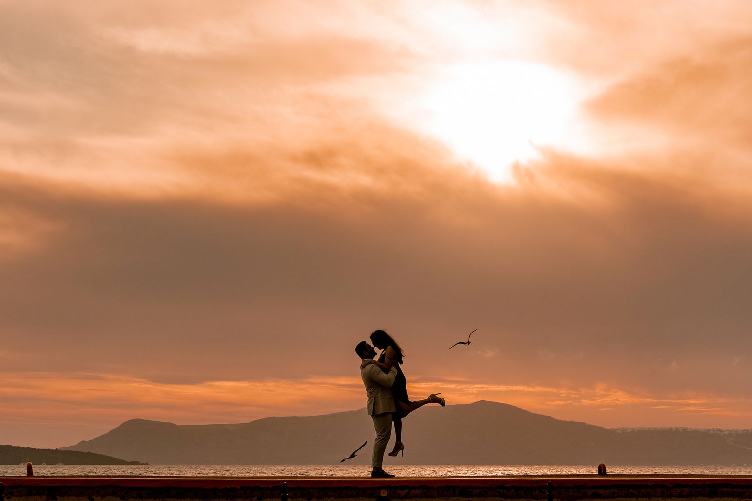 Bride saying yes during a sunset proposal on a Santorini terrace with ocean view, joyful and intimate 🌅
