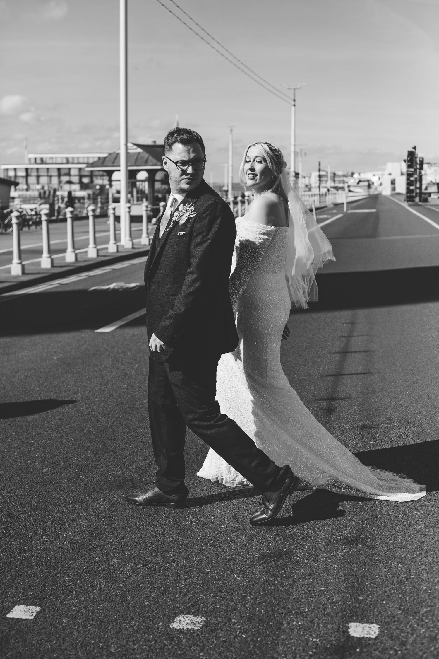 A wedding couple on Brighton Beach for some relaxed candid portraits