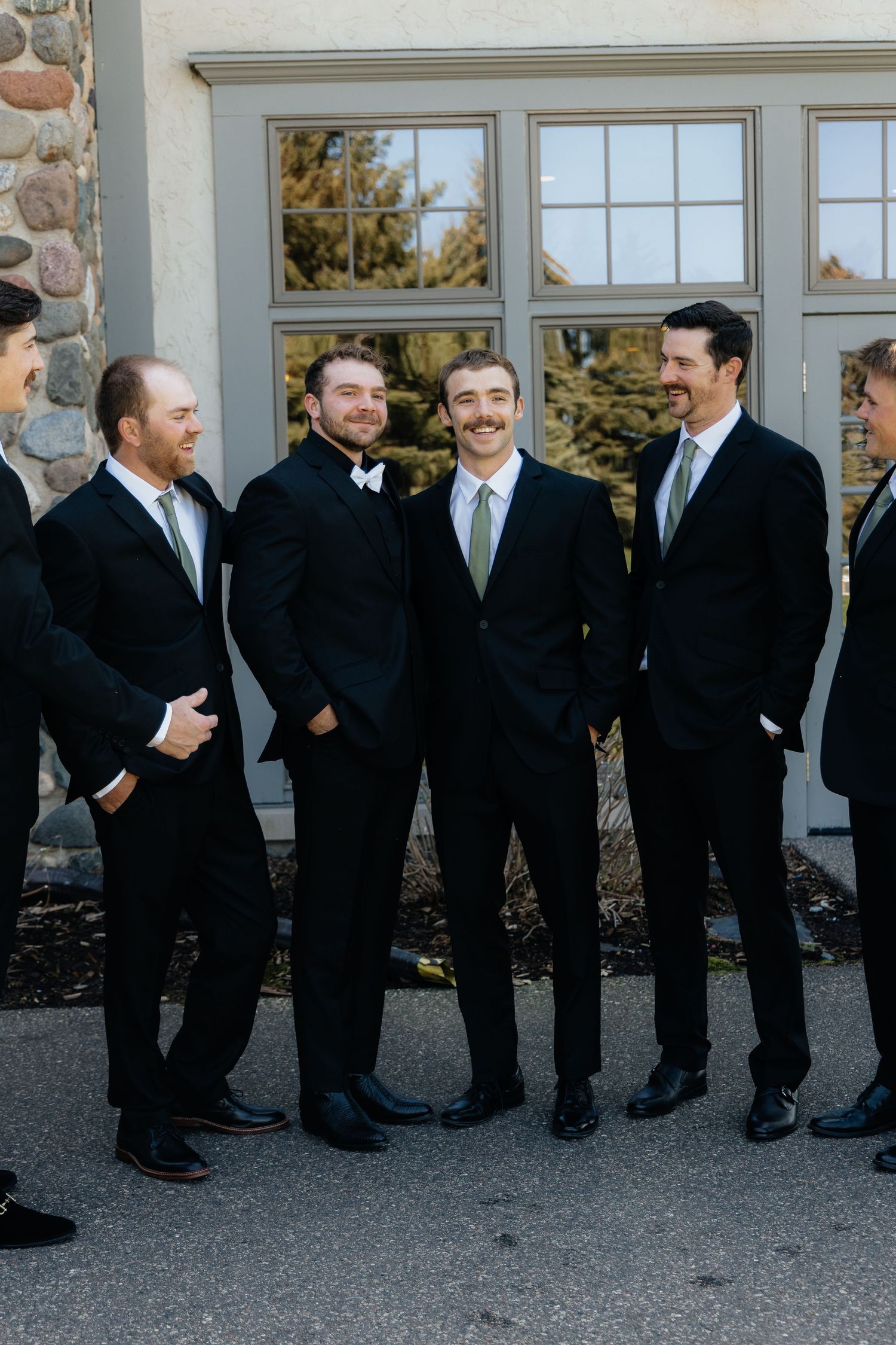 Candid and styled wedding detail shots at Rush Creek Golf Course in Maple Grove, MN, featuring emotional moments with friends and family