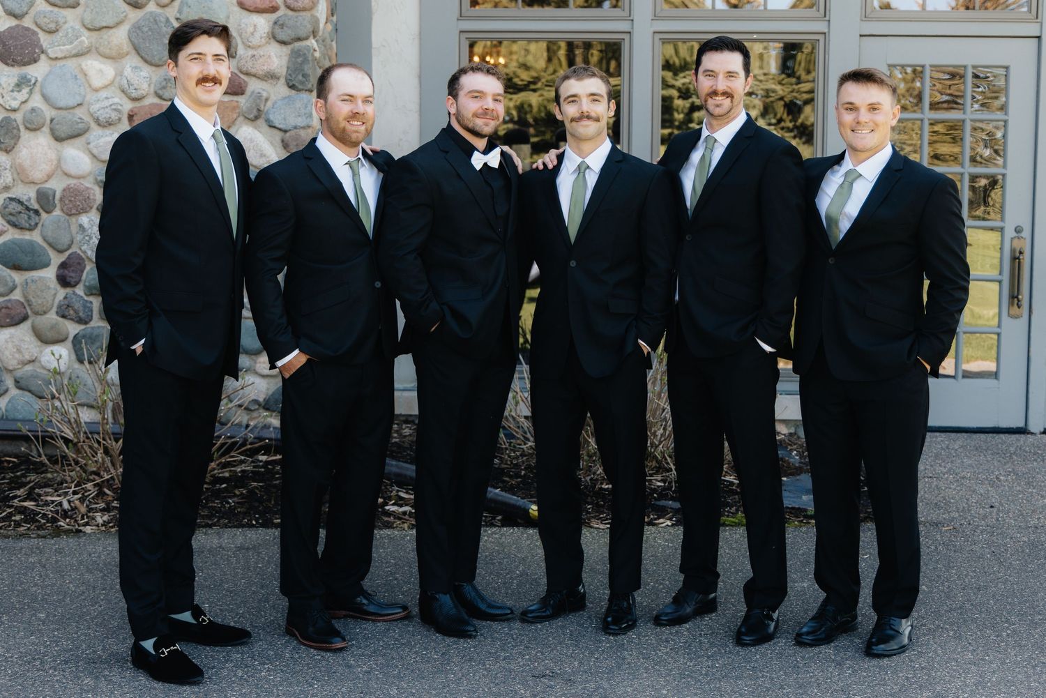Candid and styled wedding detail shots at Rush Creek Golf Course in Maple Grove, MN, featuring emotional moments with friends and family