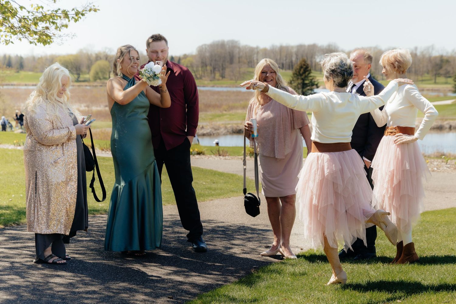 Candid and styled wedding detail shots at Rush Creek Golf Course in Maple Grove, MN, featuring emotional moments with friends and family