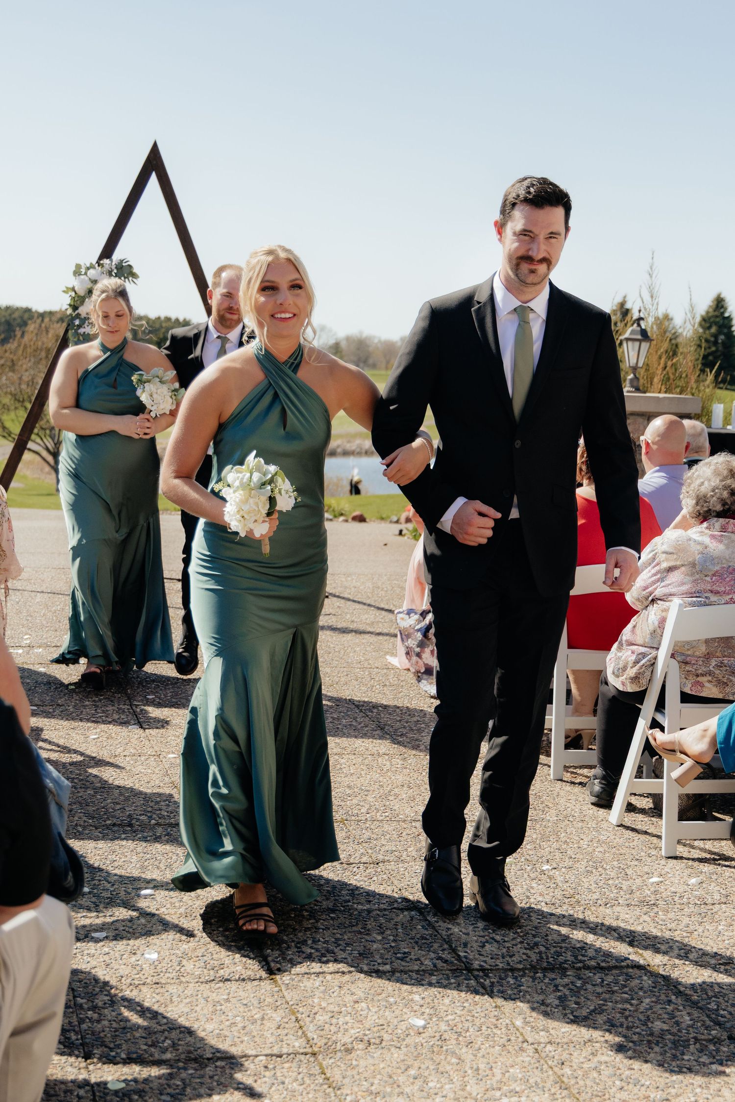 Candid and styled wedding detail shots at Rush Creek Golf Course in Maple Grove, MN, featuring emotional moments with friends and family