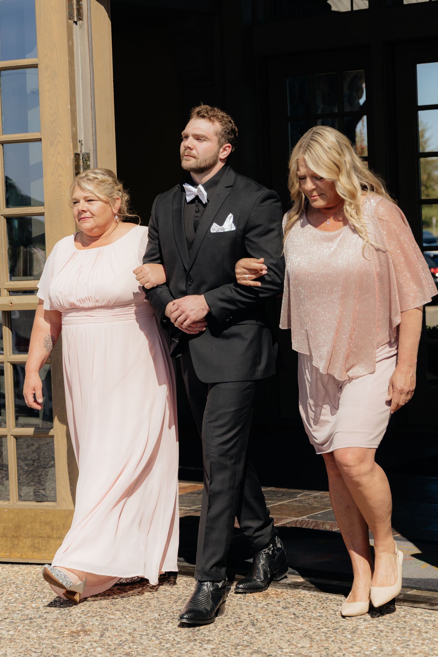 Candid and styled wedding detail shots at Rush Creek Golf Course in Maple Grove, MN, featuring emotional moments with friends and family