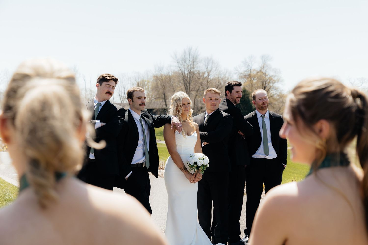 Candid and styled wedding detail shots at Rush Creek Golf Course in Maple Grove, MN, featuring emotional moments with friends and family