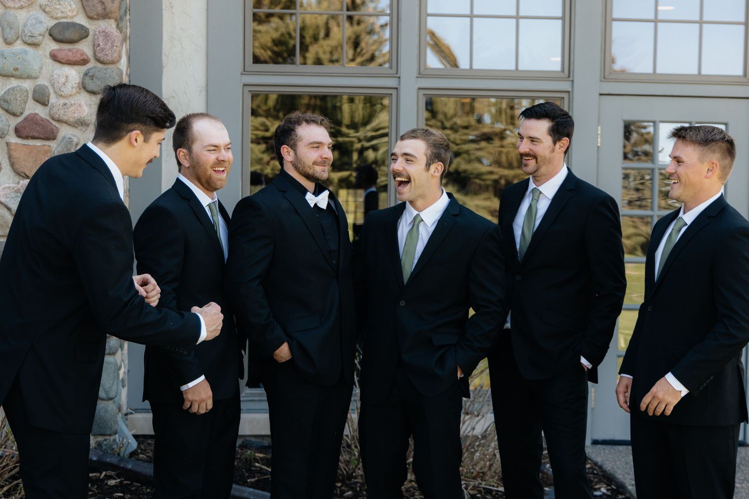 Candid and styled wedding detail shots at Rush Creek Golf Course in Maple Grove, MN, featuring emotional moments with friends and family