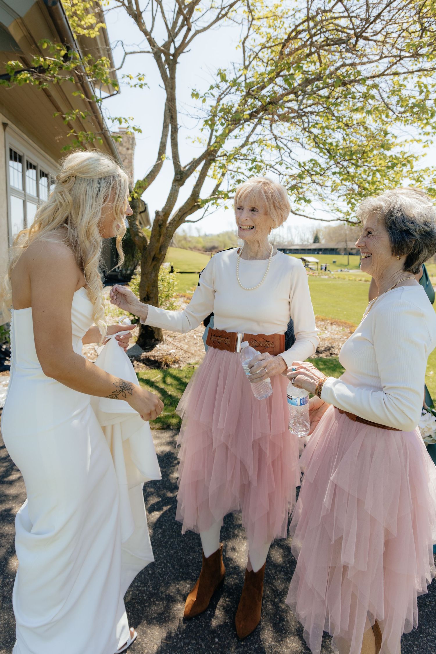 Candid and styled wedding detail shots at Rush Creek Golf Course in Maple Grove, MN, featuring emotional moments with friends and family