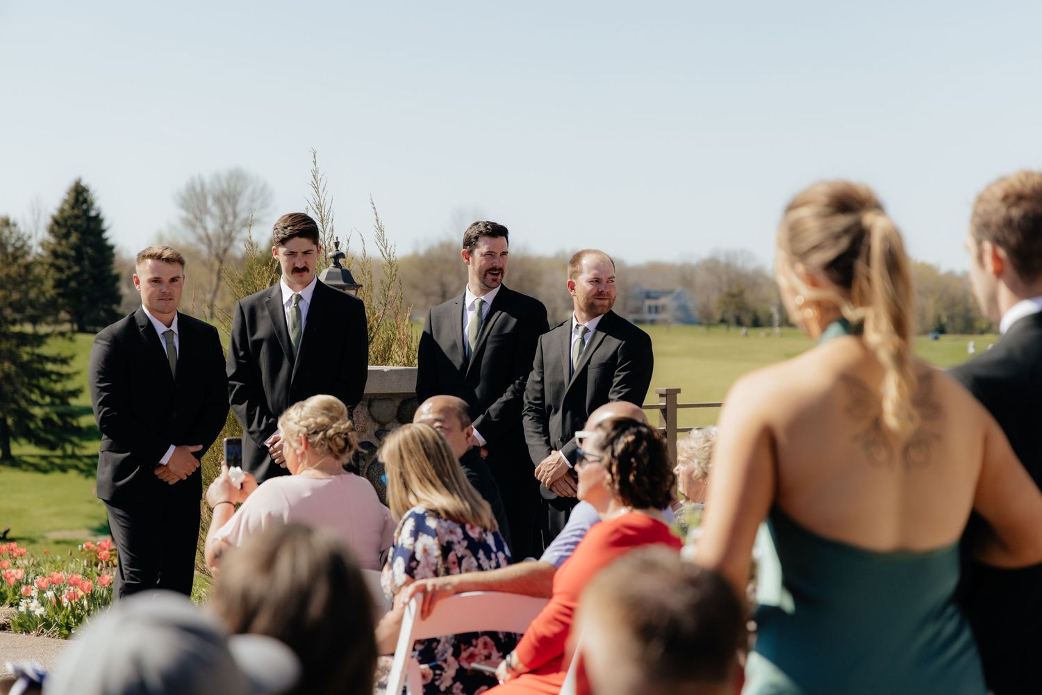 Candid and styled wedding detail shots at Rush Creek Golf Course in Maple Grove, MN, featuring emotional moments with friends and family
