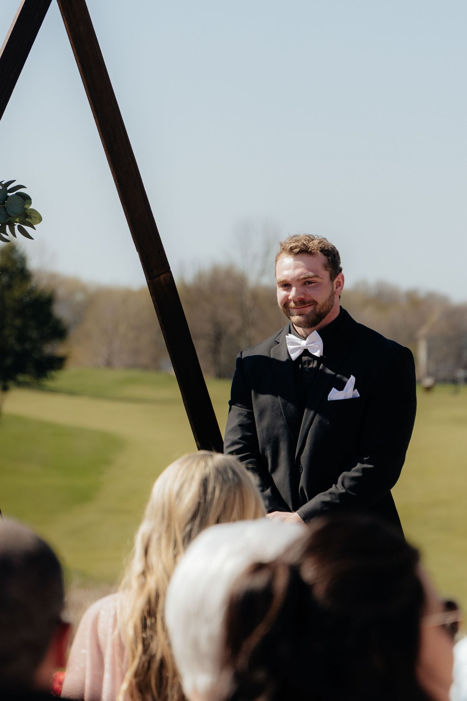 Candid and styled wedding detail shots at Rush Creek Golf Course in Maple Grove, MN, featuring emotional moments with friends and family