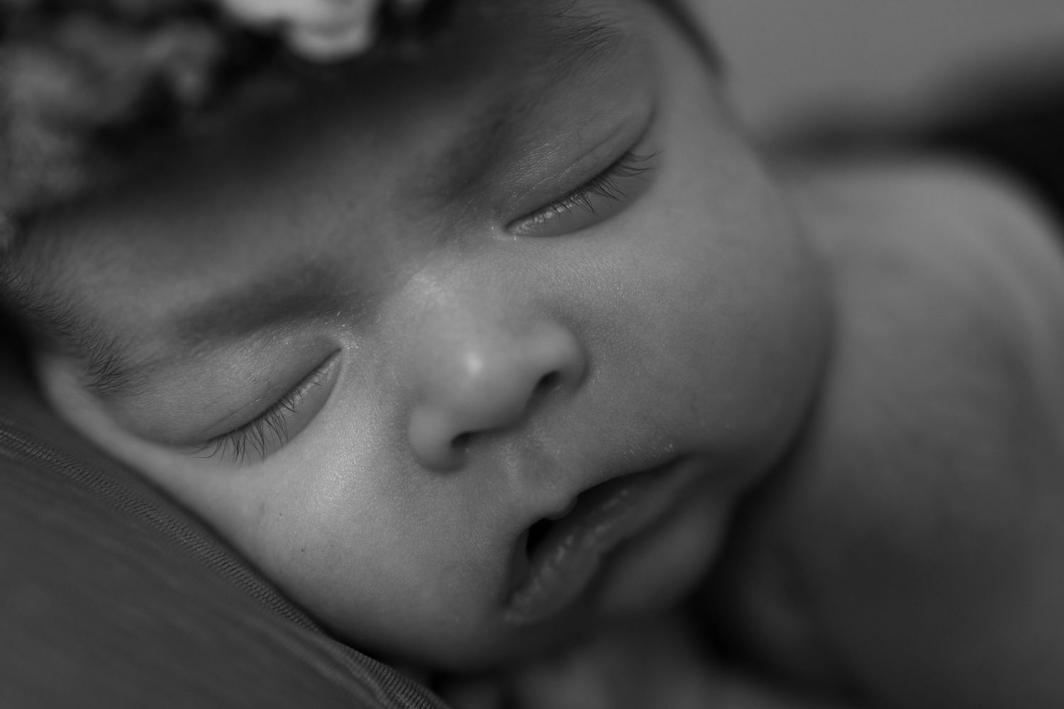 Black and white close-up photo series showing intimate facial expressions and emotional moments.