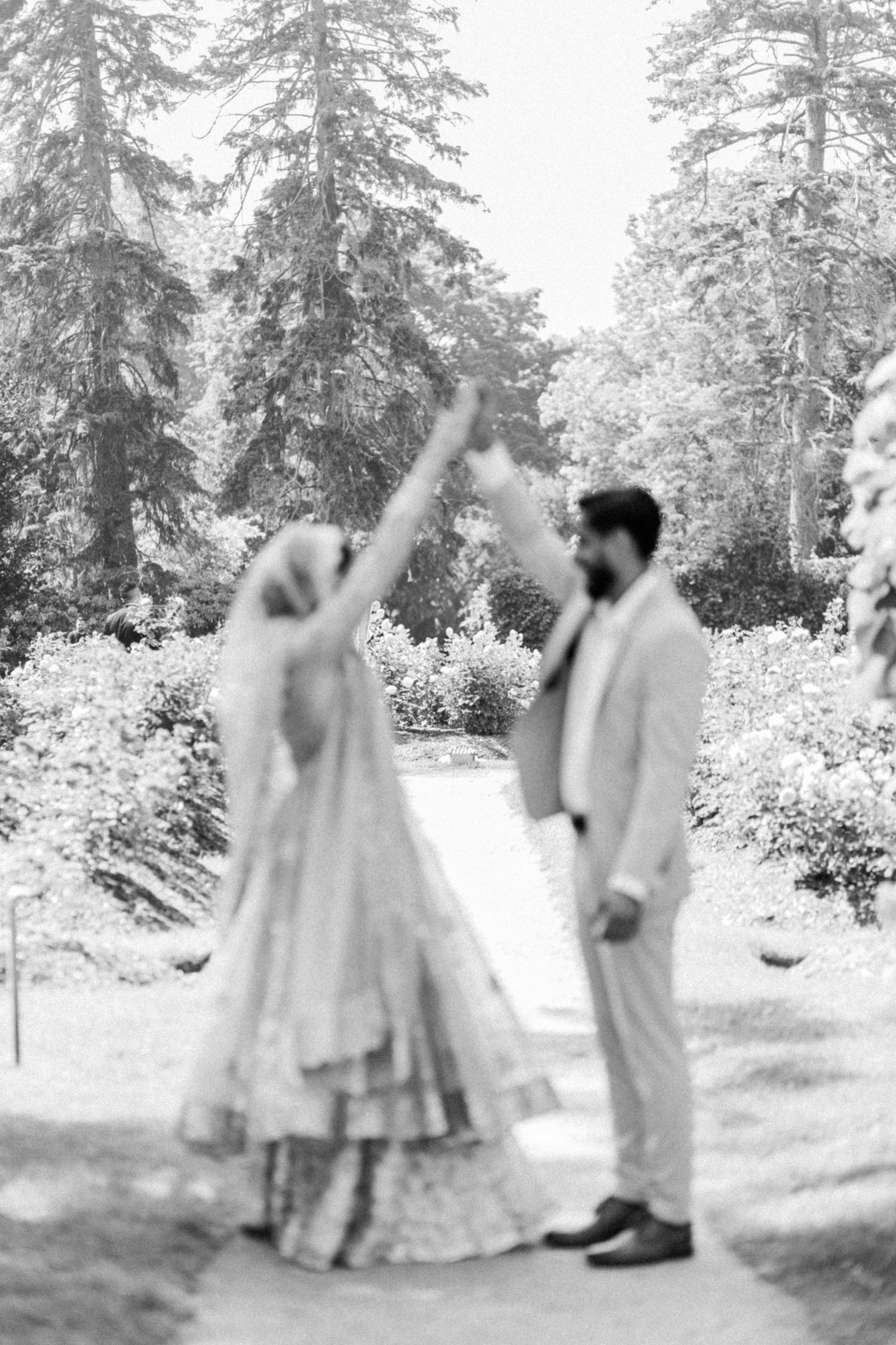 A sequence of vintage black and white photographs showing couples dancing together in a snowy forest setting.